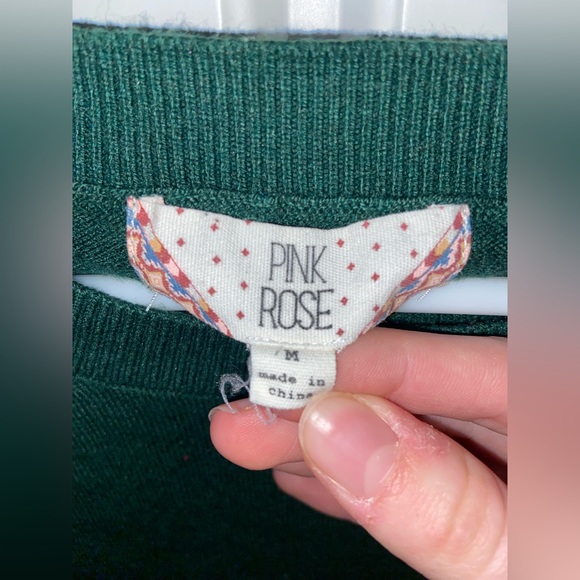 This is a dark green sweater perfect for a fall day! - Picture 3 of 4